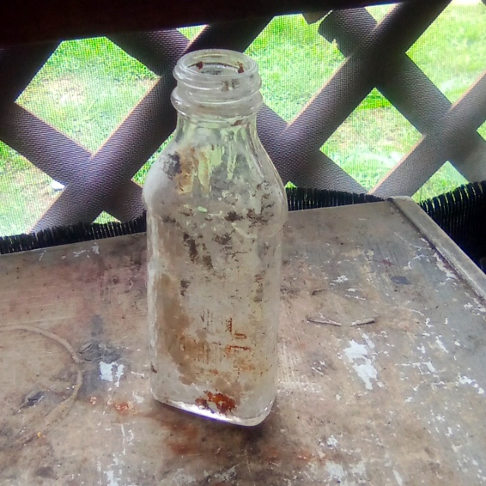Antique shoe cleaner bottle